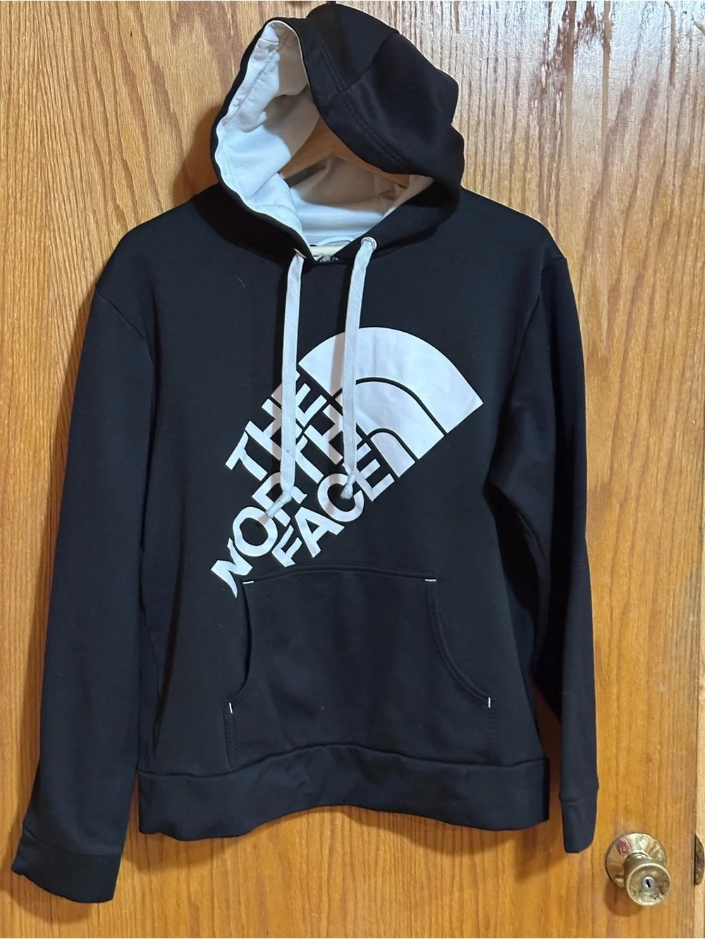 The North Face men’s sz large Black Hoodie with White Logo